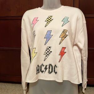 Women’s cropped sweatshirt in light cream color w/ ACDC design.